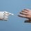 human vs ai robot hands reaching out
